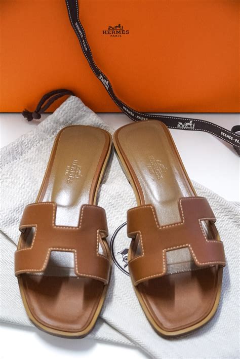 hermes tricks runner into wearing sandals|Hermes oran sandals review.